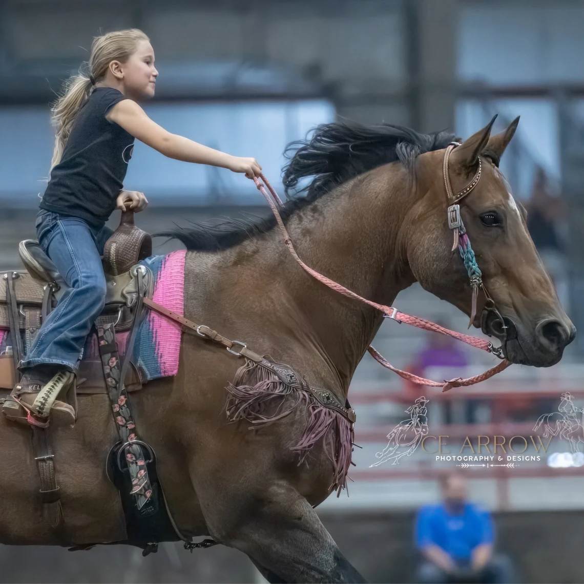 Girl in motion on a brown horse